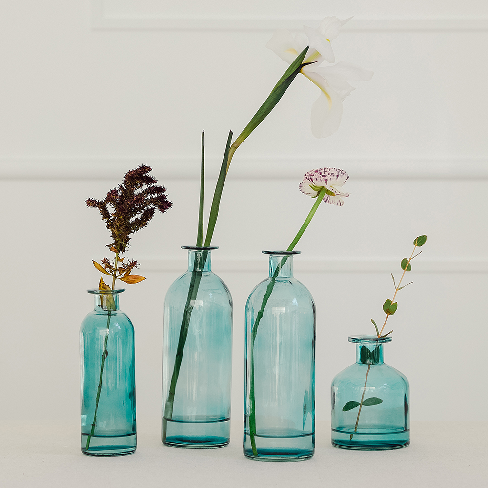 4-Piece Glass Bottle Vase Set with Various Vase Heights